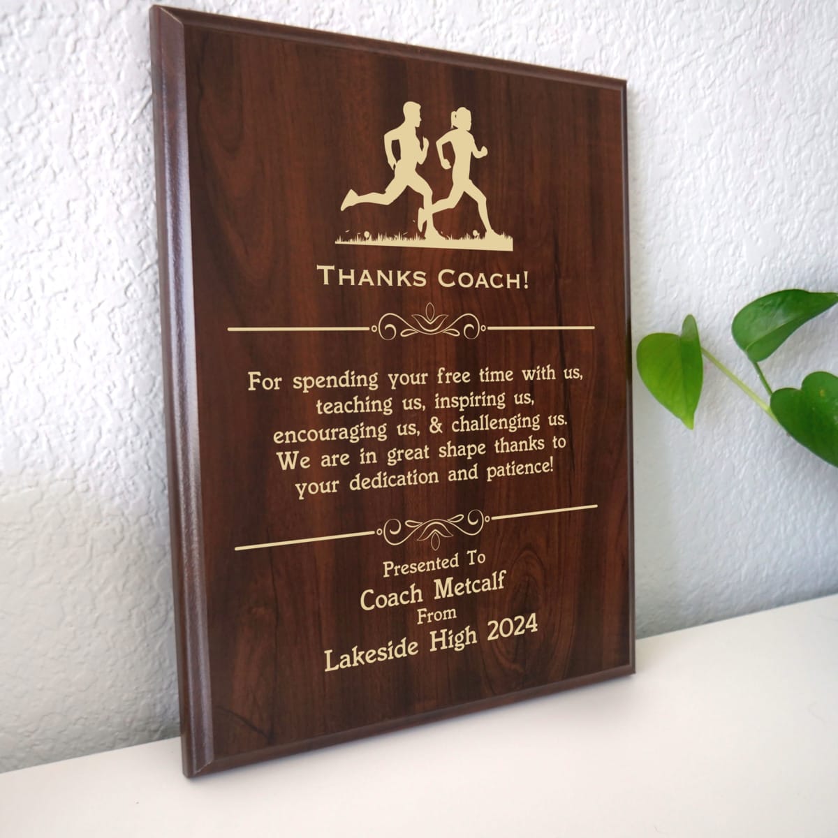 Photo of plaque resting on table at an angle.