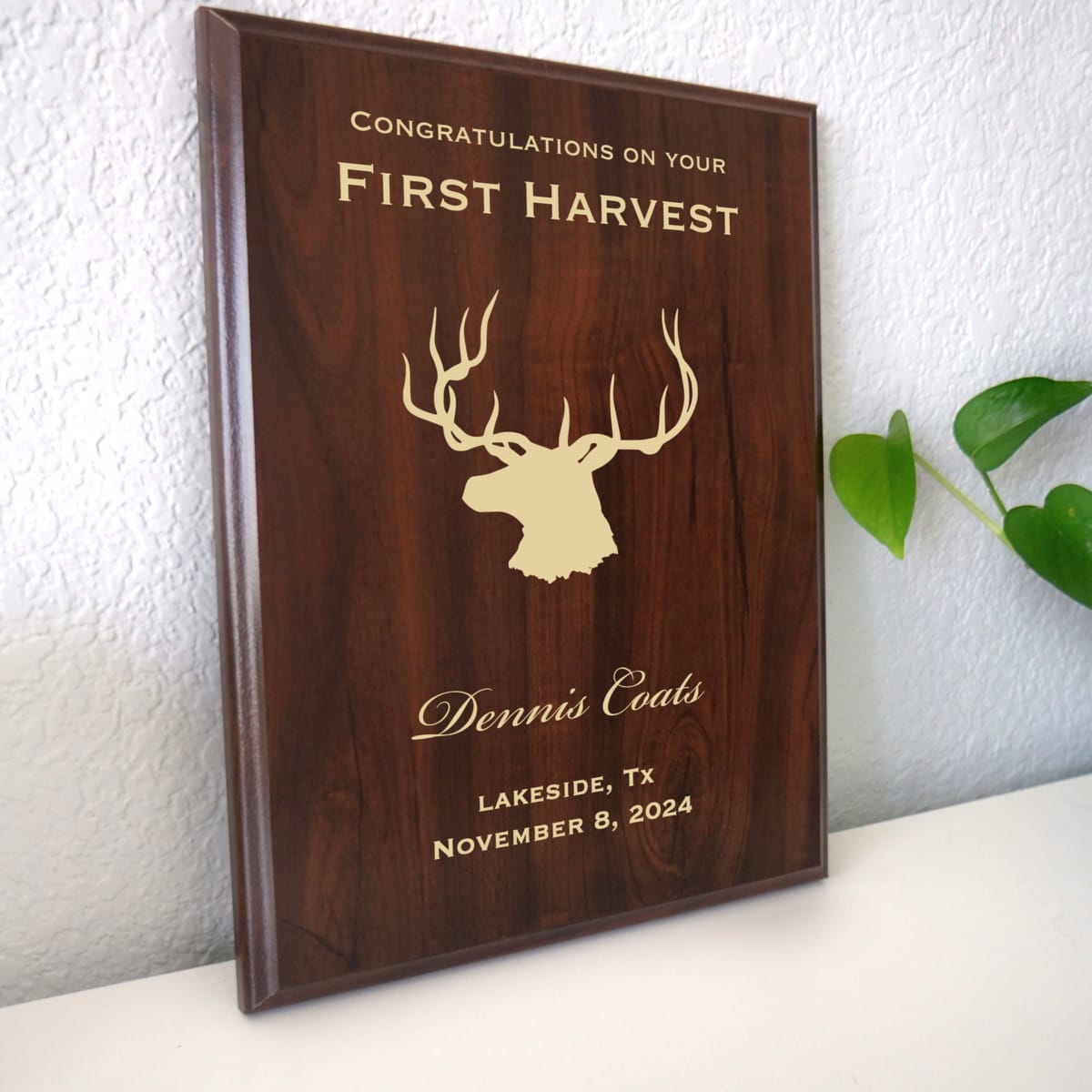Photo of plaque resting on table at an angle.