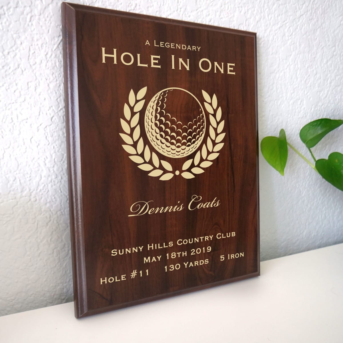 Photo of plaque resting on table at an angle.