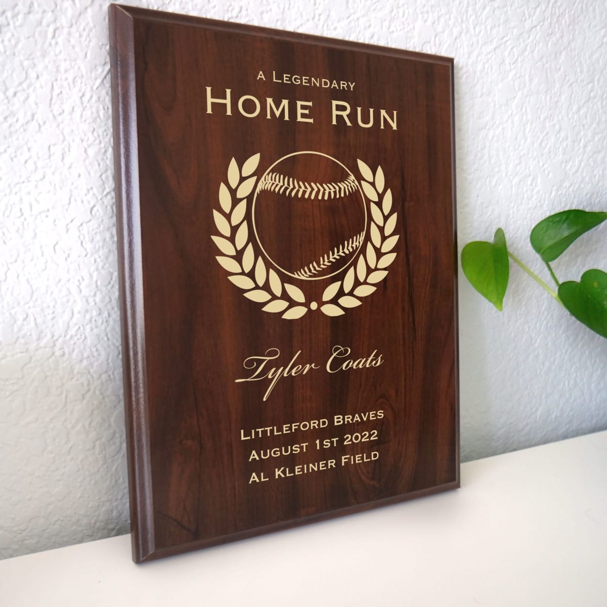 Photo of plaque resting on table at an angle.