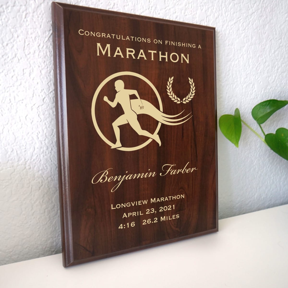 Photo of plaque resting on table at an angle.