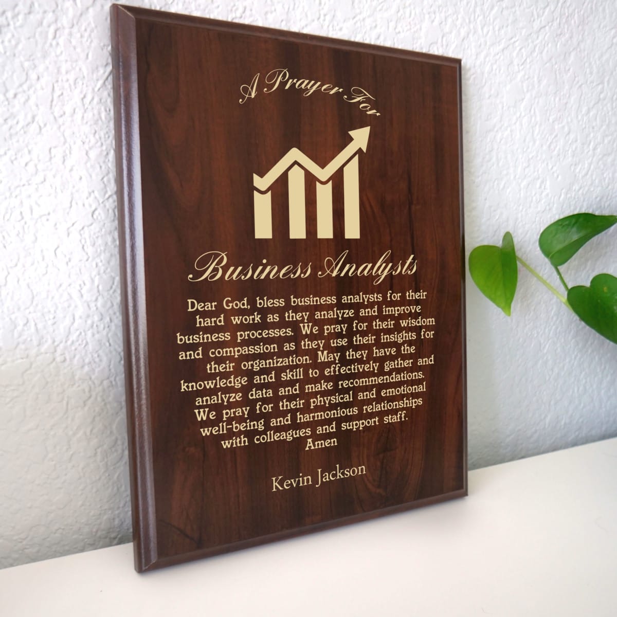 Photo of plaque resting on table at an angle.
