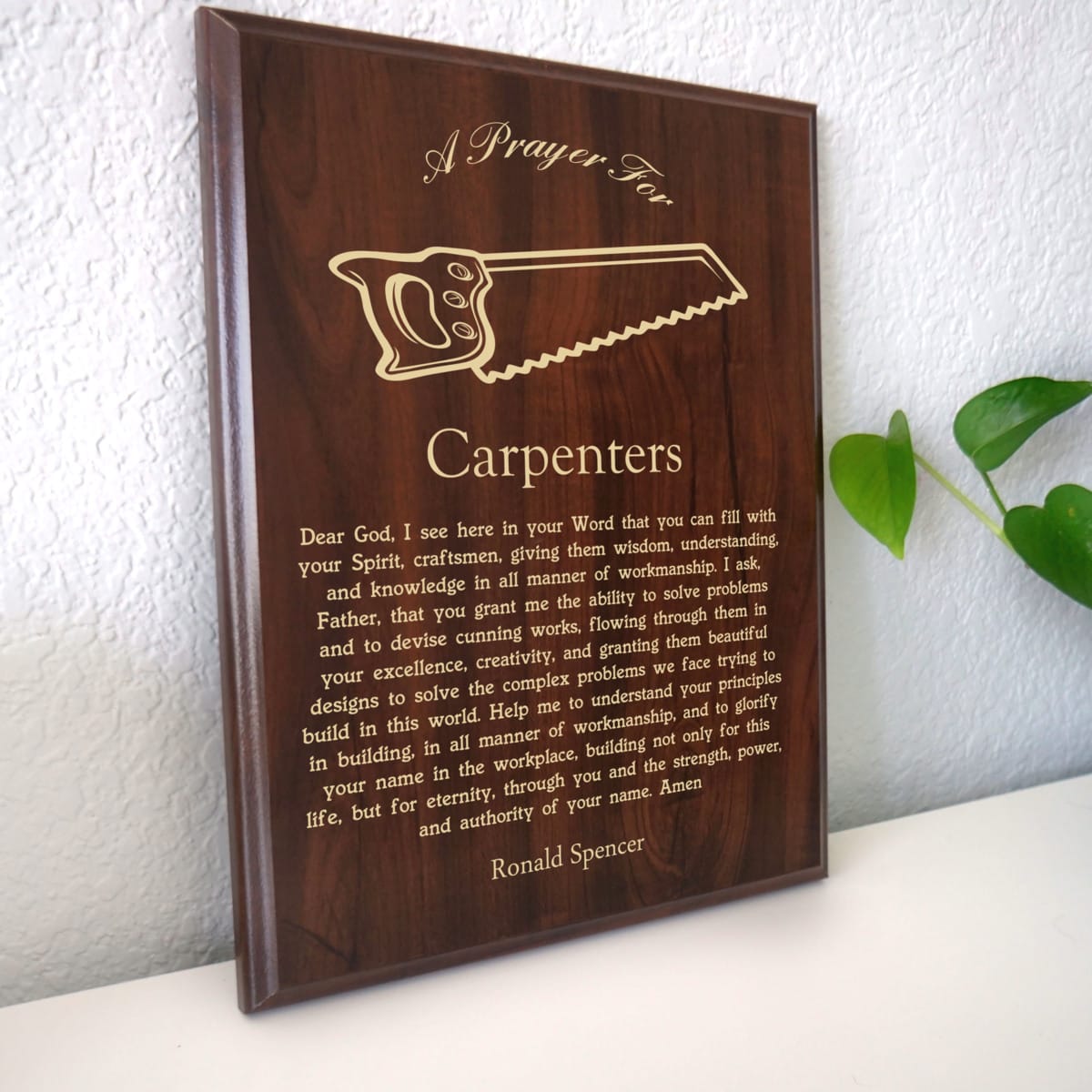 Photo of plaque resting on table at an angle.