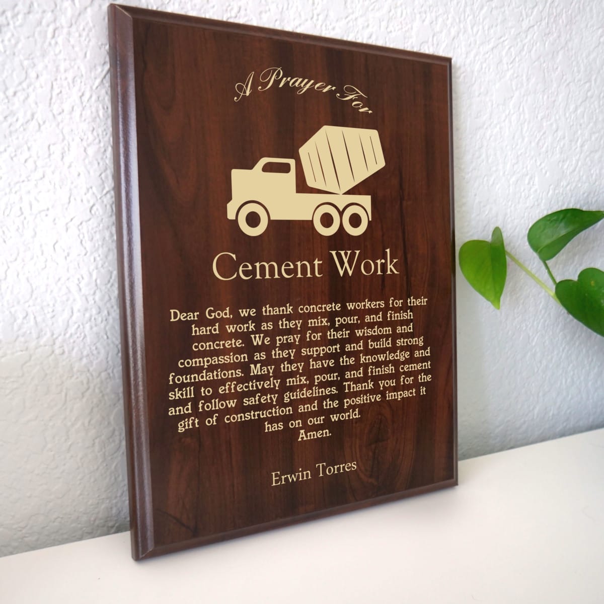Photo of plaque resting on table at an angle.