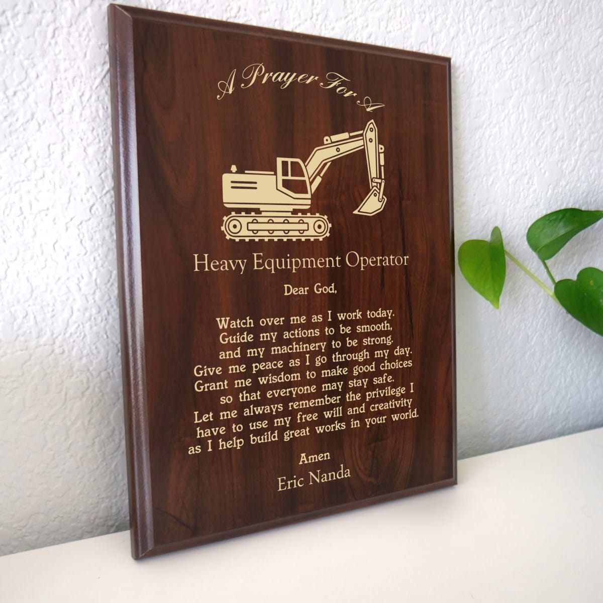 Photo of plaque resting on table at an angle.