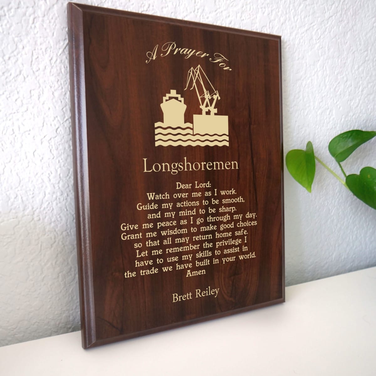 Photo of plaque resting on table at an angle.