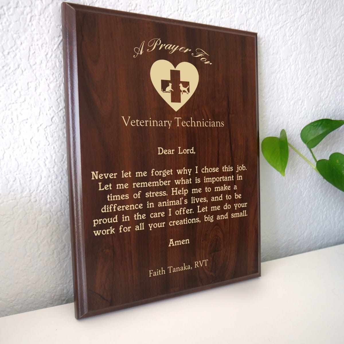Photo of plaque resting on table at an angle.