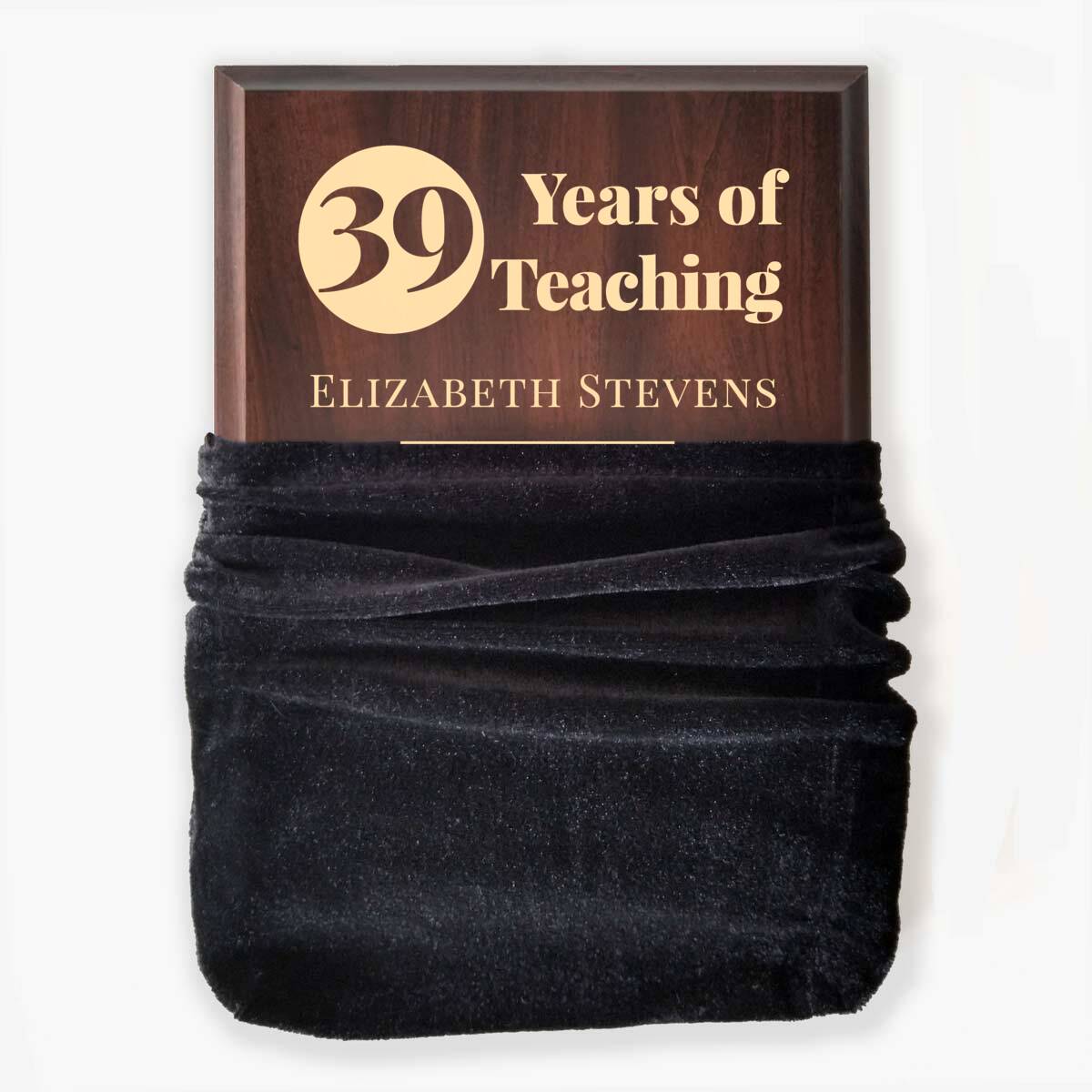 Photo of plaque inside the optional velvet gift bag, showing some of the printed design.