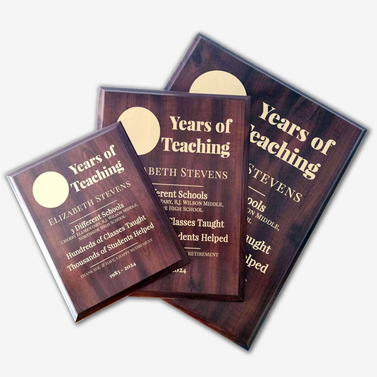 Photo of different sizes of the plaque spread out.