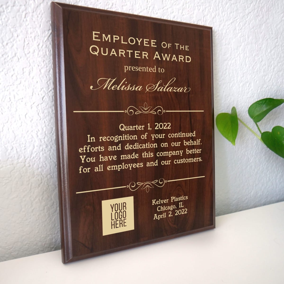 Photo of plaque resting on table at an angle.